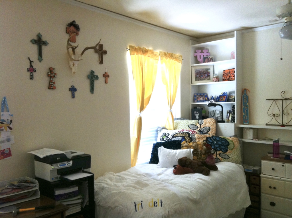 University of Texas Tri Delta house, white bedding, crosses, anthropology pillows