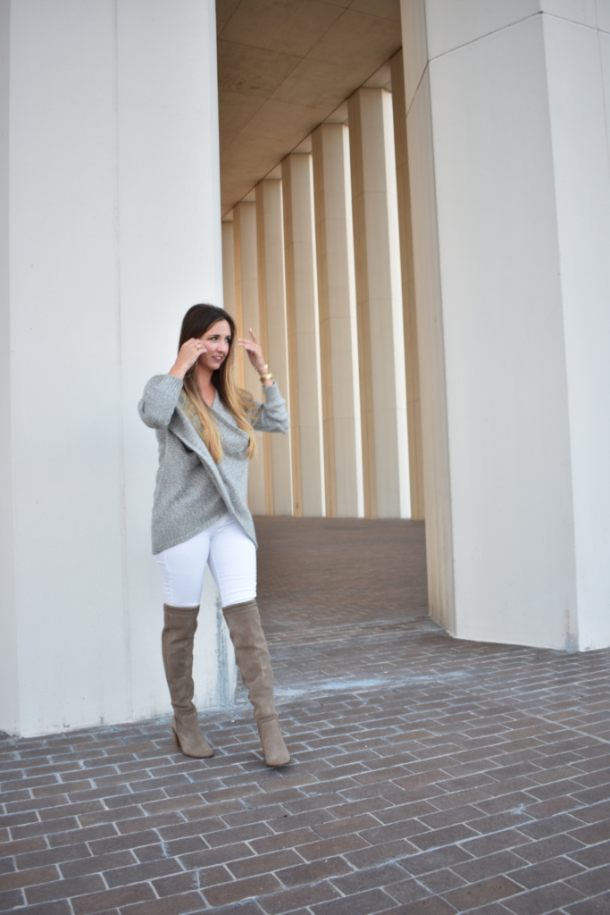 Grey wrap sweater with white jeans and over the knee boots