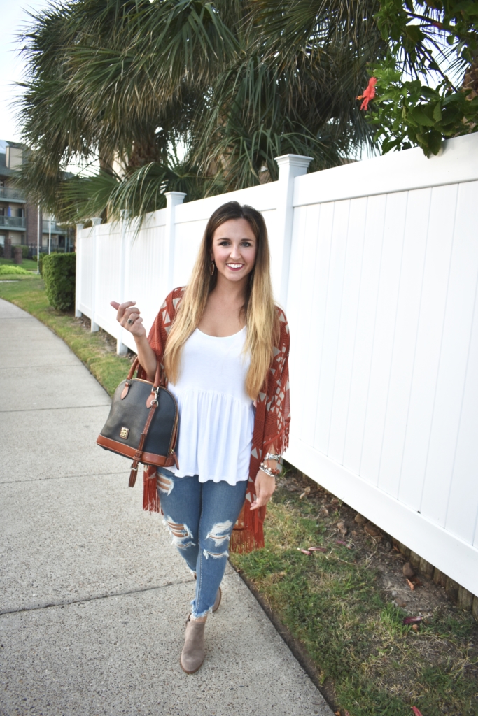 Burnt Orange kimono with distressed jeans, booties, and dooney and bourke bag