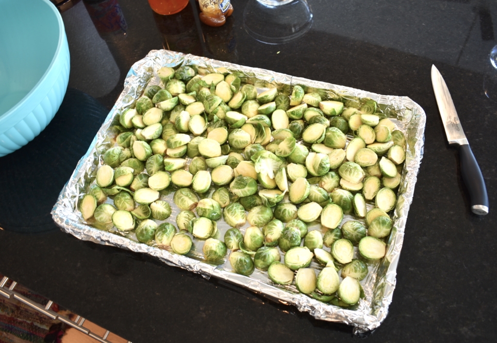 halved brussels sprouts on cookie sheet