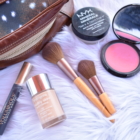 makeup bag, Loreal mascara, makeup brushes, neutrogena foundation, nyx blush and mineral powder