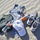 lulu lemon tank and shorts, brooks running shoes, nike hat, sunscreen, bottled water and sunglasses